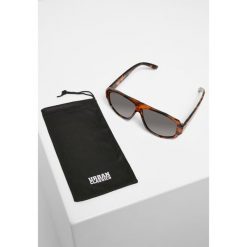 Okulary przeciwsłoneczne Urban Classics 101 uc. Brązowe okulary przeciwsłoneczne Urban Classics, bez wzorów, sportowe. Za 73.00 zł.