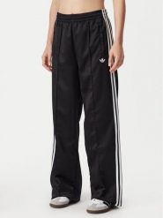 Adidas Spodnie dresowe Satin Sst KS9372 Czarny Loose Fit. Czarne spodnie dresowe Adidas, xs, bez wzorów, z dresówki. Za 349.99 zł.