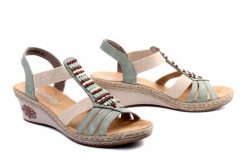RIEKER V2451-52 green, sandały damskie. Zielone sandały Rieker, bez wzorów, bez obcasa, na koturnie, bez zapięcia. Za 179.94 zł.