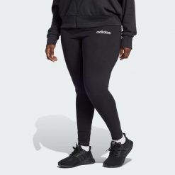 Legginsy Essentials Linear Cotton (Plus Size). Białe legginsy Adidas, plus size, bez wzorów, z bawełny. W wyprzedaży za 69.50 zł.