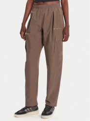Adidas Spodnie outdoor Terrex Xploric JM9857 Brązowy Loose Fit. Brązowe spodnie sportowe Adidas, s, bez wzorów, z syntetyku, outdoorowe. Za 439.99 zł.