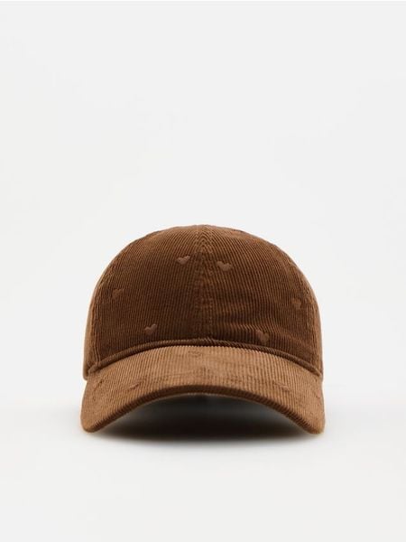 Czapka z wiązaniem - brązowy. Brązowe czapki Reserved, bez wzorów. Za 59.99 zł.