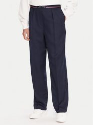 Lacoste Spodnie materiałowe HF5307 Granatowy Relaxed Fit. Niebieskie spodnie materiałowe Lacoste, bez wzorów, z materiału. Za 999.99 zł.