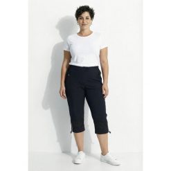 Damskie Funkcyjne rozciągliwe rybaczki proste nogawki hydrofobowe. Czarne spodnie sportowe Ulla Popken, plus size, bez wzorów, z elastanu. Za 389.99 zł.