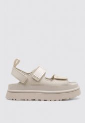Sandały Ugg Australian W Złotym Świecie Damskie. Białe sandały UGG, bez wzorów, z materiału, bez obcasa, na platformie, bez zapięcia. Za 523.99 zł.