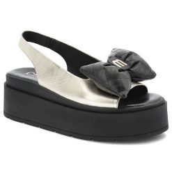 Sandały damskie Chebello, ze skóry naturalnej na wysokiej platformie z kokardą wsuwane, złote, 4641-046. Żółte sandały CheBello, bez wzorów, ze skóry, wizytowe, bez obcasa, na platformie, bez zapięcia. Za 319.00 zł.