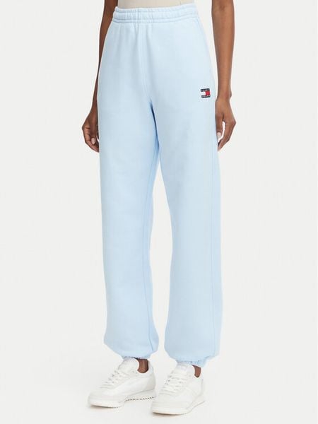 Tommy Jeans Spodnie dresowe DW0DW22780 Niebieski jasny Regular Fit. Niebieskie spodnie dresowe Tommy Jeans, s, bez wzorów, z bawełny. Za 281.99 zł.