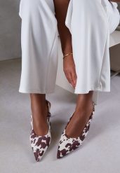 Brązowe Sandały Vices w Krowie Łaty na Szpilce Slingback Raleira. Brązowe sandały Renee, bez wzorów, z jeansu, klasyczne, ze szpiczastym noskiem, bez obcasa, na obcasie, bez zapięcia. Za 69.99 zł.