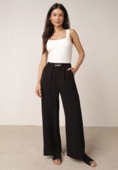 Czarne Spodnie Casual o Szerokim Kroju z Wysokim Stanem i Aplikacją Hystoinne. Czarne spodnie materiałowe Born2be, do pracy, l, z aplikacjami, z jeansu, z podwyższonym stanem, plus size, długie. Za 49.99 zł.