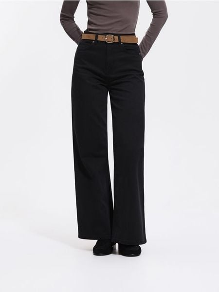 Jeansy wide leg z dodatkiem lyocellu - czarny. Czarne jeansy Reserved, bez wzorów. Za 159.99 zł.