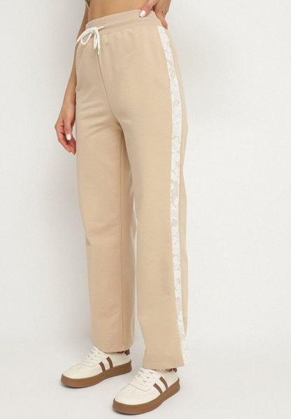 Beżowe Spodnie Dresowe z Bawełną i Wysokim Stanem Ozdobione Koronką Evarose. Brązowe spodnie dresowe Born2be, l, bez wzorów, z bawełny, z podwyższonym stanem. Za 79.99 zł.