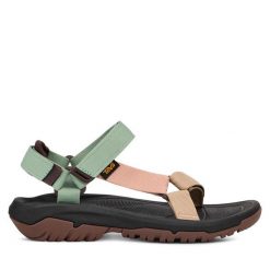 Sandały Teva. Niebieskie sandały Teva, bez wzorów, sportowe, bez obcasa, bez zapięcia. Za 219.99 zł.