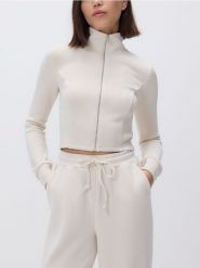 Rozpinana bluza z modalem - kremowy. Białe bluzy Reserved, l, bez wzorów, z dzianiny, bez kaptura. Za 119.99 zł.