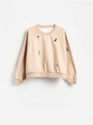 Bluza z haftowanym wzorem - wielobarwny. Bluzy Reserved, l, bez wzorów, z bawełny, bez kaptura. Za 129.99 zł.