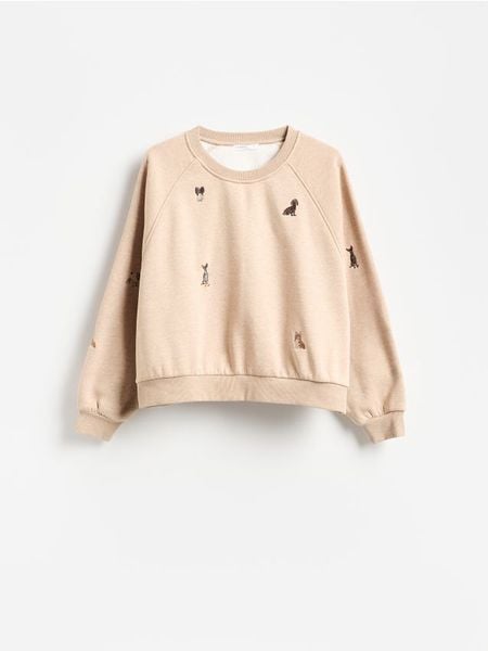 Bluza z haftowanym wzorem - wielobarwny. Bluzy Reserved, l, bez wzorów, z bawełny, bez kaptura. Za 129.99 zł.