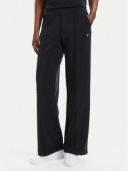 Guess Spodnie dresowe V6YB18 K4315 Czarny Regular Fit. Czarne spodnie dresowe Guess, s, z aplikacjami, z dresówki. Za 394.99 zł.