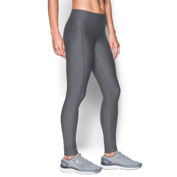 Legginsy treningowe damskie Under Armour HeatGear. Szare legginsy Under Armour, bez wzorów, z elastanu, do biegania. W wyprzedaży za 177.00 zł.
