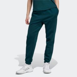 Spodnie fitness damskie ADIDAS. Spodnie materiałowe Adidas, na co dzień, s, bez wzorów, z materiału. Za 269.99 zł.