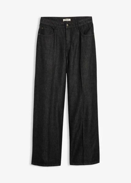 Dżinsy z szerokimi nogawkami, mid waist. Czarne jeansy bonprix, bez wzorów. Za 124.99 zł.