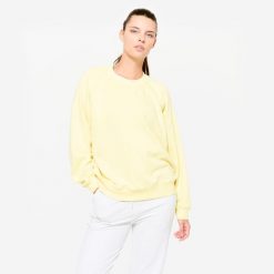 Bluza damska Domyos Gym & Pilates. Żółte bluzy DOMYOS, m, bez wzorów, z materiału, bez kaptura. W wyprzedaży za 49.99 zł.