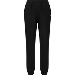 Damskie spodnie dresowe Athlecia Carmen. Czarne spodnie dresowe Athlecia, bez wzorów, z dresówki. Za 180.50 zł.