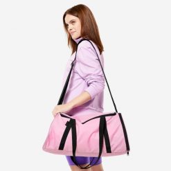 Torba fitness Domyos 20 l. Czerwone torby na ramię DOMYOS, bez wzorów, z materiału, sportowe, na ramię, bez dodatków. W wyprzedaży za 39.99 zł.