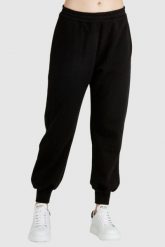 ALEXANDER MCQUEEN Czarne dresowe spodnie damskie, Rozmiar 44. Czarne spodnie dresowe Alexander McQueen, s, bez wzorów, z dresówki. W wyprzedaży za 849.99 zł.