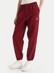 Calvin Klein Jeans Spodnie dresowe Monologo LV047B235G Bordowy Regular Fit. Czerwone spodnie dresowe Calvin Klein Jeans, m, bez wzorów, z bawełny. Za 389.99 zł.