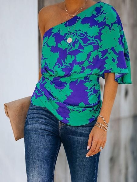 Milan Kiss Bluzka w kolorze zielono-niebieskim rozmiar: M. Niebieskie bluzki Milan Kiss, m, bez wzorów, bez kołnierzyka, bez ramiączek. Za 70.41 zł.