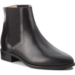 Sztyblety UNISA - Belki F18 Ne Black Newman. Czarne botki Unisa, bez wzorów, ze skóry, bez obcasa, na obcasie, bez zapięcia. W wyprzedaży za 339.00 zł.