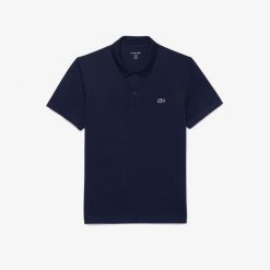Polo Lacoste Hombre. Niebieskie koszulki polo Lacoste, l, bez wzorów, bez kołnierzyka, bez ramiączek. Za 322.60 zł.