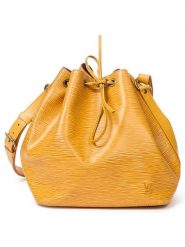 Louis Vuitton Skórzana torebka w kolorze żółtym - 24 x 26 x 18 cm rozmiar: onesize. Żółte torby na ramię Louis Vuitton, bez wzorów, z materiału, na ramię, bez dodatków. Za 3,145.99 zł.