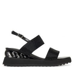 Sandały GOE. Czarne sandały GOE, bez wzorów, bez obcasa, na koturnie, bez zapięcia. Za 399.99 zł.