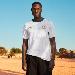 Koszulka piłkarska replika Puma Senegal Mistrzostwa Świata 2026 domowa. Bluzki Puma, s, bez wzorów, sportowe, bez kołnierzyka, bez ramiączek. Za 449.99 zł.