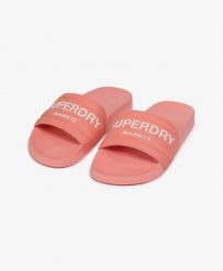 Superdry klapki Destination Pool z wyściełanym paskiem – Peach Amber Pink. Czerwone klapki Superdry, bez wzorów, z poliesteru, bez obcasa. Za 152.50 zł.