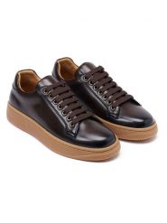 British Passport Skórzane sneakersy w kolorze brązowym rozmiar: 36. Brązowe trampki British Passport, bez wzorów, bez zapięcia. Za 347.99 zł.