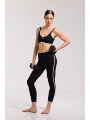 Onamaste Legginsy sportowe "Flow" w kolorze czarnym rozmiar: L/XL. Czarne legginsy Onamaste, l, bez wzorów, z materiału, outdoorowe. Za 121.99 zł.