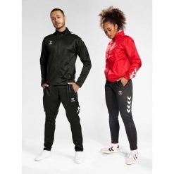 Spodnie treningowe Hummel Core XK Poly. Czarne spodnie dresowe Hummel, bez wzorów. Za 180.00 zł.