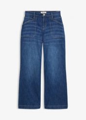 Jeansy z szerokimi nogawkami, mid waist, i naszywanymi kieszeniami. Niebieskie jeansy bonprix, bez wzorów. Za 159.99 zł.