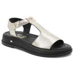 Złote Sandały Karino Modne Obuwie Damskie. Żółte sandały Karino, bez wzorów, ze skóry, eleganckie, bez obcasa, bez zapięcia. Za 359.99 zł.
