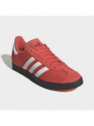 Adidas Skórzane sneakersy "Gazelle" w kolorze pomarańczowym rozmiar: 38,5. Pomarańczowe trampki Adidas, bez wzorów, bez zapięcia. Za 283.48 zł.