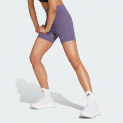 Legginsy Own the Run Short. Fioletowe legginsy Adidas, s, bez wzorów, z materiału, krótkie. Za 219.00 zł.