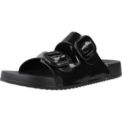 Sandały IGOR S10334 Czarny. Czarne sandały Igor, bez wzorów, z gumy, bez obcasa, bez zapięcia. Za 154.99 zł.