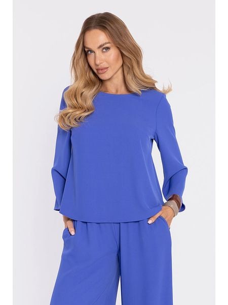 Made of emotion Bluzka w kolorze niebieskim rozmiar: S. Niebieskie bluzki Made Of Emotion, s, bez wzorów, bez kołnierzyka, bez ramiączek. Za 139.95 zł.
