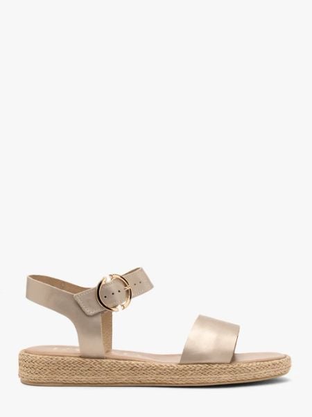 Platynowe sandały damskie płaskie. Szare sandały Ryłko, bez wzorów, ze skóry, eleganckie, bez obcasa, na płaskiej podeszwie, bez zapięcia. W wyprzedaży za 199.99 zł.