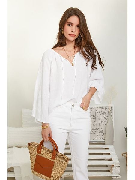 Rodier Lin Lniana bluzka w kolorze białym rozmiar: L/XL. Białe bluzki Rodier Lin, l, bez wzorów, ze lnu, bez kołnierzyka, bez ramiączek. Za 131.12 zł.