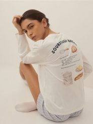 Dwuczęściowa piżama z haftem i nadrukiem - jasnoniebieski. Niebieskie piżamy Reserved, bez wzorów, z bawełny, bez ramiączek. Za 109.99 zł.