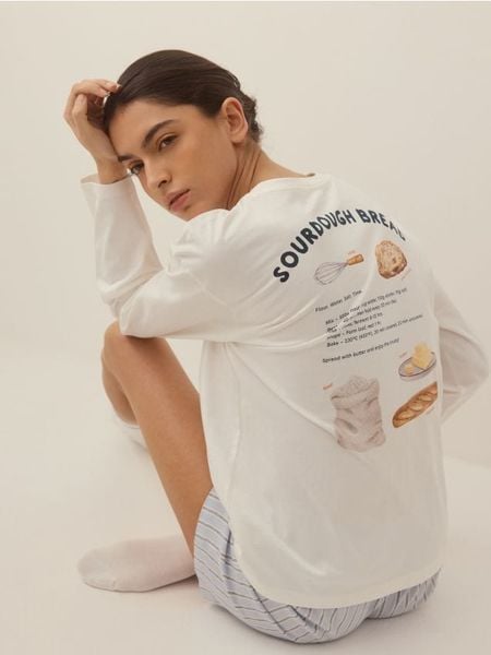 Dwuczęściowa piżama z haftem i nadrukiem - jasnoniebieski. Niebieskie piżamy Reserved, bez wzorów, z bawełny, bez ramiączek. Za 109.99 zł.