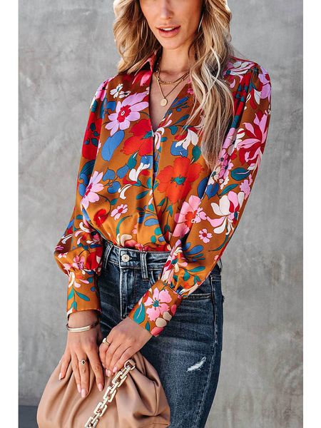 Milan Kiss Bluzka w kolorze pomarańczowym ze wzorem rozmiar: L. Pomarańczowe bluzki Milan Kiss, l, bez wzorów, bez kołnierzyka, bez ramiączek. Za 143.22 zł.