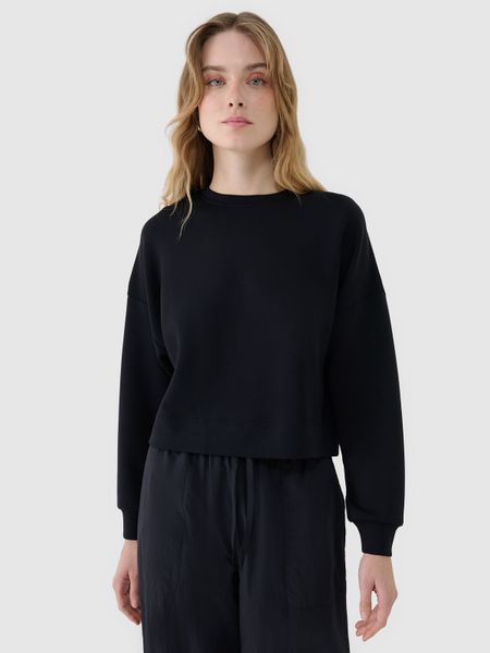 4F Bluza dresowa nierozpinana z modalem damska - czarna M. Czarne bluzy 4f, m, bez wzorów, z dresówki, bez kaptura. W wyprzedaży za 89.99 zł.